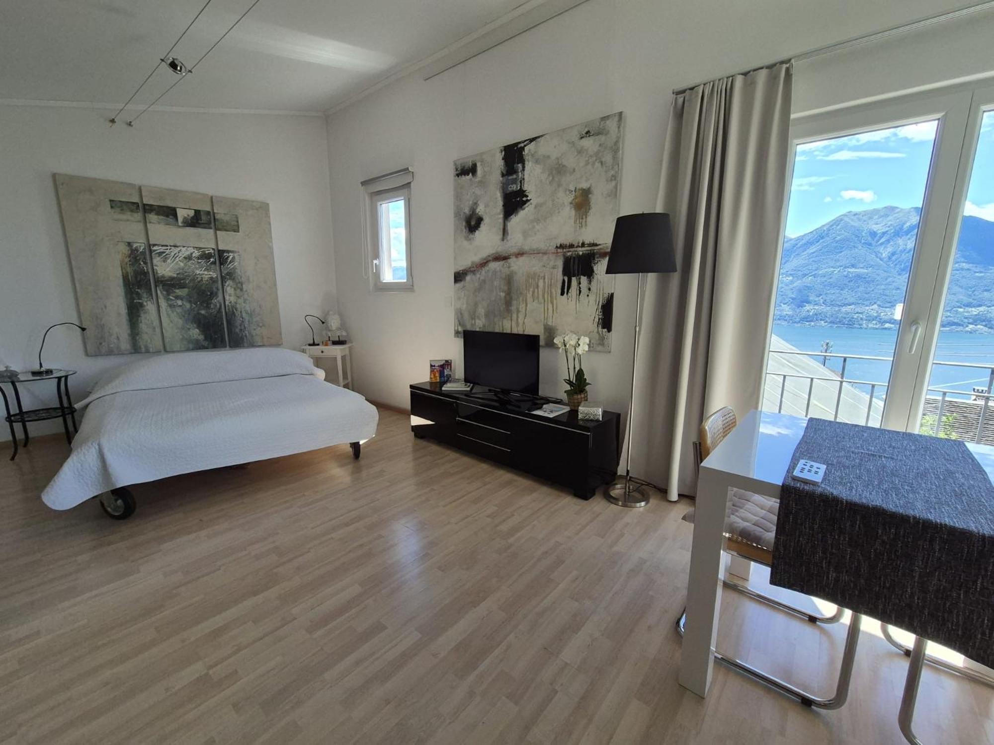 Апартаменты Casa Grillino Локарно Номер фото